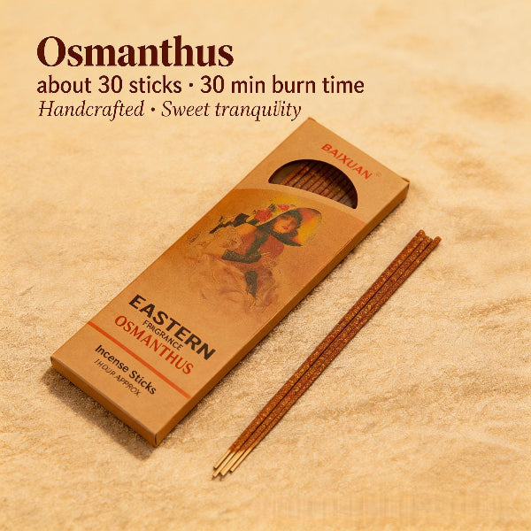 Box of Eastern Osmanthus incense sticks with a single stick on a beige background
