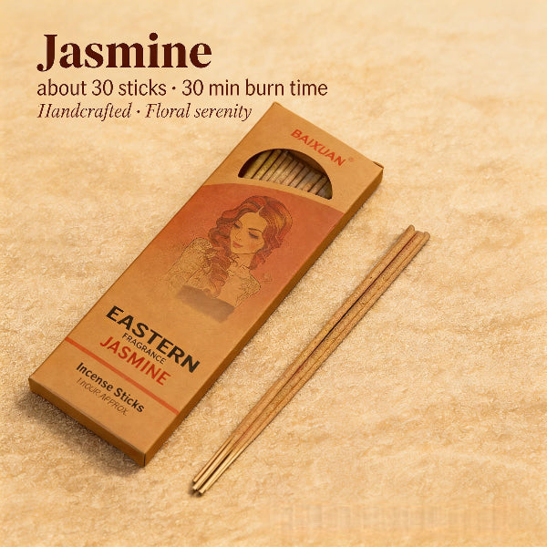 Box of Jasmine incense sticks with a single stick on a beige background