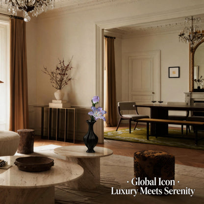 Luxurious living room with marble coffee table, vase with luxury glass flowers, and elegant decor.