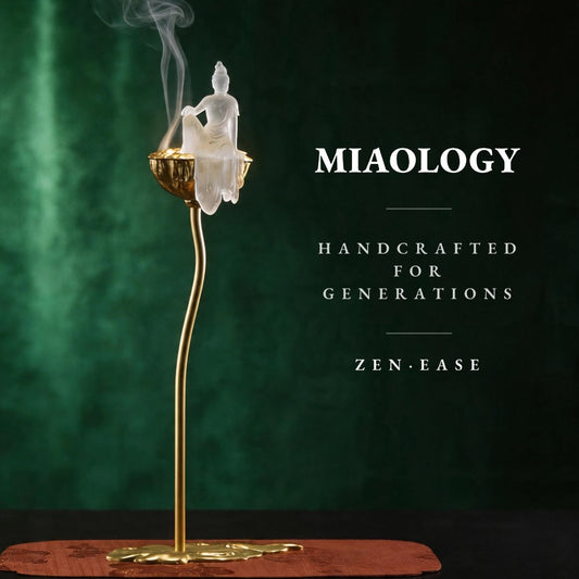 Decorative incense holder with a Buddha figure and smoke, branded 'MIAOLOGY', on a dark background.
