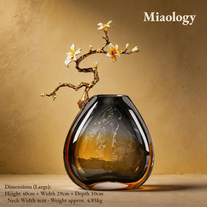 Decorative vase with a branch and flowers on a beige background, featuring the brand 'Miaology'.